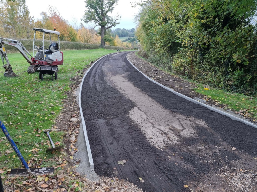 This is a large driveway which is in the process of having a tar and chip driveway installed on by Sheppey Driveways